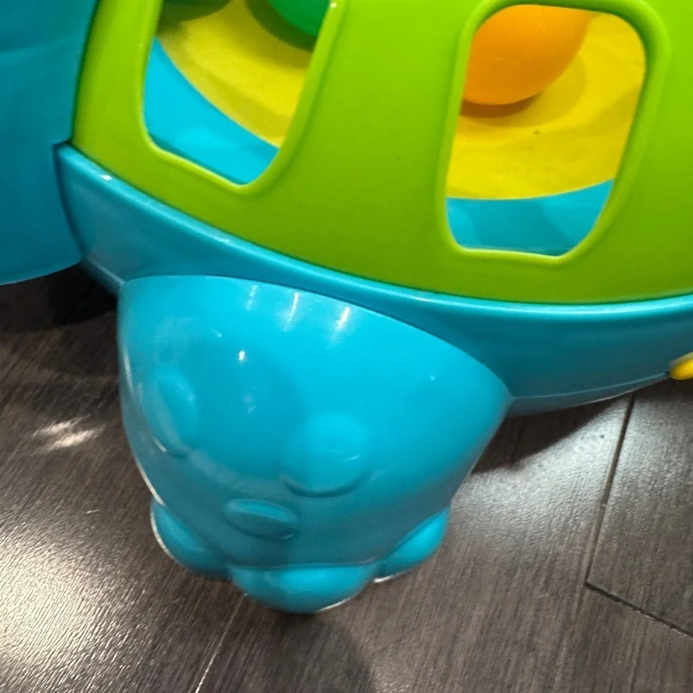 Fisher-Price Go Baby Go! Poppity Pop Musical Colorful Dinosaur Ball Toy Toddler
